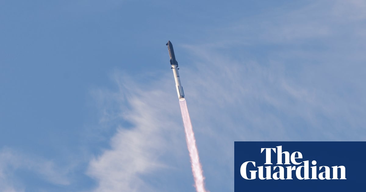Rocket heading upwards against blue sky